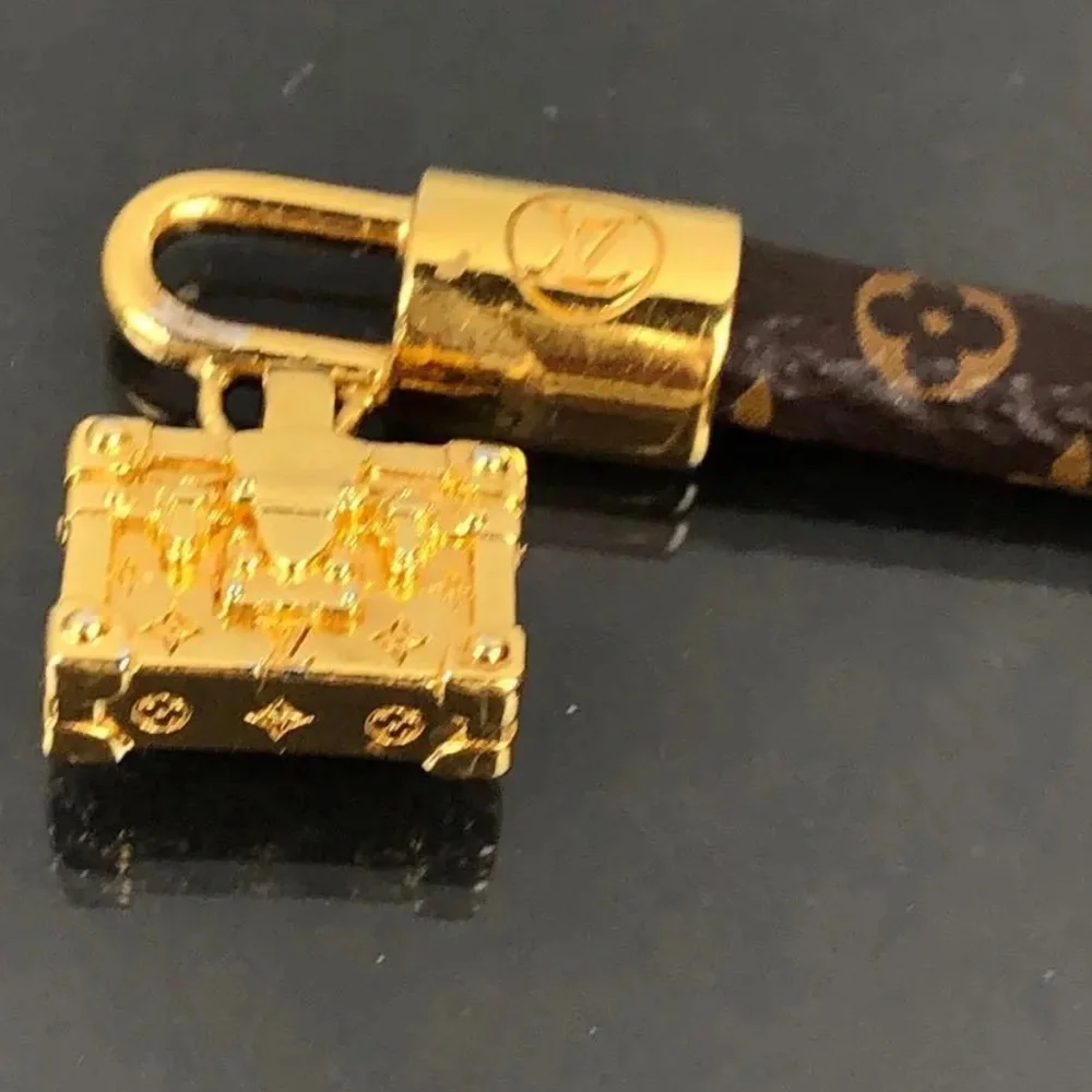Louis Vuitton luxury bracelet with adorable luggage charm!! - Picture 4 of 11